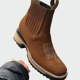 Botas de cowboy em pele